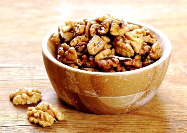 Walnuts are packed with omega-3 fats, which can prevent dry scalp and dandruff. (Shutterstock)