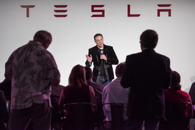 Elon Musk, chairman and chief executive officer of Tesla Motors Inc., speaks during a news conference prior to unveiling the Model X sport utility vehicle (SUV) during an event in Fremont, California. (Bloomberg File Photo) Elon Musk, chairman and chief executive officer of Tesla Motors Inc., speaks during a news conference prior to unveiling the Model X sport utility vehicle (SUV) during an event in Fremont, California. (Bloomberg File Photo)