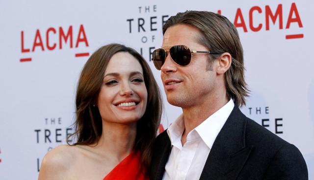 Brad Pitt and actor Angelina Jolie pose at the premiere of The Tree of Life at LACMA in Los Angeles. (REUTERS) Brad Pitt and actor Angelina Jolie pose at the premiere of The Tree of Life at LACMA in Los Angeles. (REUTERS)