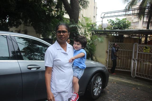 Taimur Ali Khan is all smiles in his nanny’s arms. Taimur Ali Khan is all smiles in his nanny’s arms.