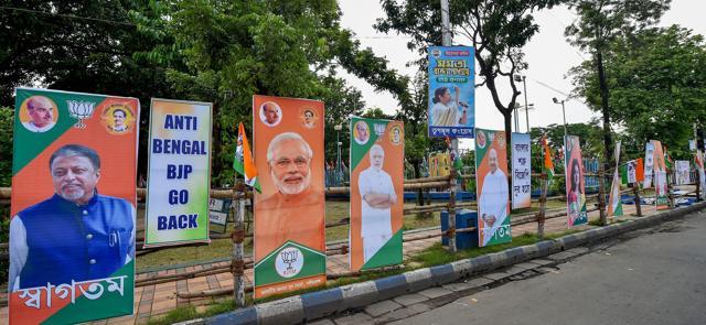 A poster with the slogan "Anti-Bengal BJP Go Back" is seen along with the posters of BJP leaders at the venue of BJP President Amit Shah's rally, in Kolkata on Friday, August 10, 2018. (PTI) A poster with the slogan "Anti-Bengal BJP Go Back" is seen along with the posters of BJP leaders at the venue of BJP President Amit Shah's rally, in Kolkata on Friday, August 10, 2018. (PTI)