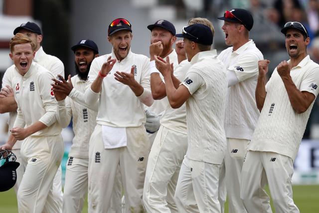 England's players react to the result of the review for the wicket of India's captain Virat Kohli. (AFP) England's players react to the result of the review for the wicket of India's captain Virat Kohli. (AFP)