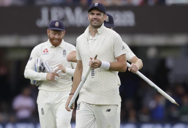 England's James Anderson leaves the pitch with his team mates after England bowled India out for 130. (AP) England's James Anderson leaves the pitch with his team mates after England bowled India out for 130. (AP)