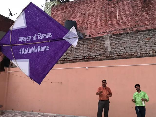 People flying kites in Old Delhi. People flying kites in Old Delhi.