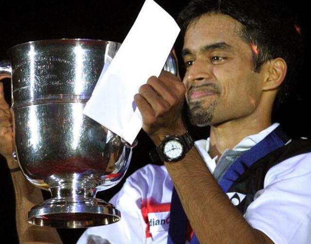 India's Pullela Gopichand holds the Silver Challenge Trophy after winning the mens singles final match against China's Chen Hong at the The Yonex All England Badminton Championships in Birmingham 11 March 2001. Gopichand defeated Chen 15-12, 15-6. (ADRIAN DENNIS/AFP/Getty Images) India's Pullela Gopichand holds the Silver Challenge Trophy after winning the mens singles final match against China's Chen Hong at the The Yonex All England Badminton Championships in Birmingham 11 March 2001. Gopichand defeated Chen 15-12, 15-6. (ADRIAN DENNIS/AFP/Getty Images)