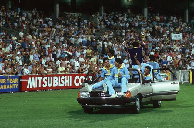 The victorious Indian cricket team take a victory lap of honour after winning the Benson & Hedges World Championship of Cricket Final between India and Pakistan at the Melbourne Cricket Ground, 10th March 1985. India won the match by 8 wickets. (Popperfoto/Getty Images) The victorious Indian cricket team take a victory lap of honour after winning the Benson & Hedges World Championship of Cricket Final between India and Pakistan at the Melbourne Cricket Ground, 10th March 1985. India won the match by 8 wickets. (Popperfoto/Getty Images)