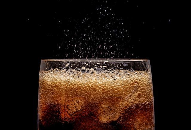 Colas are loaded with sugar (the diet versions have harmful artificial sweeteners) , as well as unhealthy dyes. (Shutterstock) Colas are loaded with sugar (the diet versions have harmful artificial sweeteners) , as well as unhealthy dyes. (Shutterstock)
