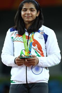 Bronze medalist Sakshi Malik of India stands during the medal ceremony after the Women's Freestyle 58 kg competition on Day 12 of the Rio 2016 Olympic Games at Caioca Arena 2 on August 17, 2016 in Rio de Janeiro, Brazil. (Getty Images) Bronze medalist Sakshi Malik of India stands during the medal ceremony after the Women's Freestyle 58 kg competition on Day 12 of the Rio 2016 Olympic Games at Caioca Arena 2 on August 17, 2016 in Rio de Janeiro, Brazil. (Getty Images)