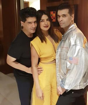 Manish Malhotra (left) with Priyanka Chopra (centre) and Karan Johar. Manish Malhotra (left) with Priyanka Chopra (centre) and Karan Johar.