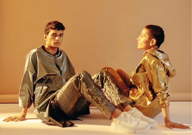 (On him): Jacket, Dhruv Kapoor; pants, Rajesh Pratap Singh; shoes, Clarks;(On her): Jacket and pants, Kanika Goyal; earrings, Varnika Arora (Farhan Hussain) (On him): Jacket, Dhruv Kapoor; pants, Rajesh Pratap Singh; shoes, Clarks;(On her): Jacket and pants, Kanika Goyal; earrings, Varnika Arora (Farhan Hussain)