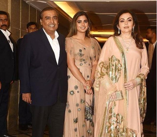 Mukesh Abani with wife Nita and daughter Isha at Priyanka Chopra’s engagement bash.