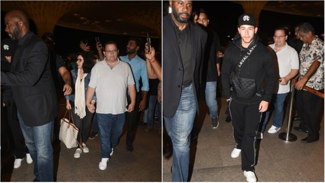 Nick Jonas and his parents at the Mumbai airport. Nick Jonas and his parents at the Mumbai airport.