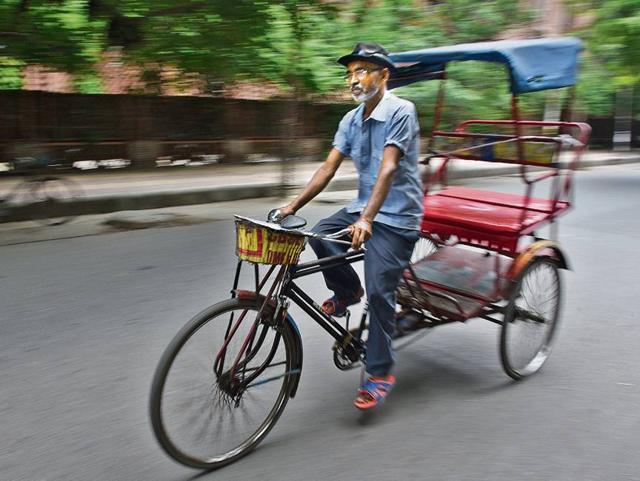 Mohammad Abbas, a rickshaw puller who migrated from Begusarai Uttar Pradesh to earn money, poses for a photo at Mayur Vihar Phase 1 in New Delhi, India. (Sanchit Khanna/ HT Photo) Mohammad Abbas, a rickshaw puller who migrated from Begusarai Uttar Pradesh to earn money, poses for a photo at Mayur Vihar Phase 1 in New Delhi, India. (Sanchit Khanna/ HT Photo)