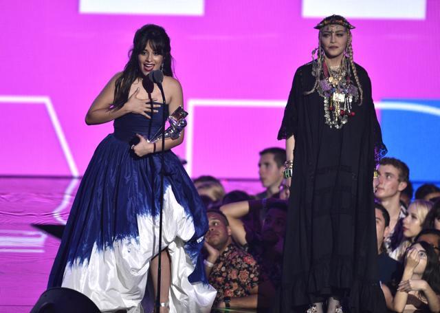 Camila Cabello, left, accepts the award for video of the year as presenter Madonna looks on at the MTV Video Music Awards. (Chris Pizzello/Invision/AP) Camila Cabello, left, accepts the award for video of the year as presenter Madonna looks on at the MTV Video Music Awards. (Chris Pizzello/Invision/AP)