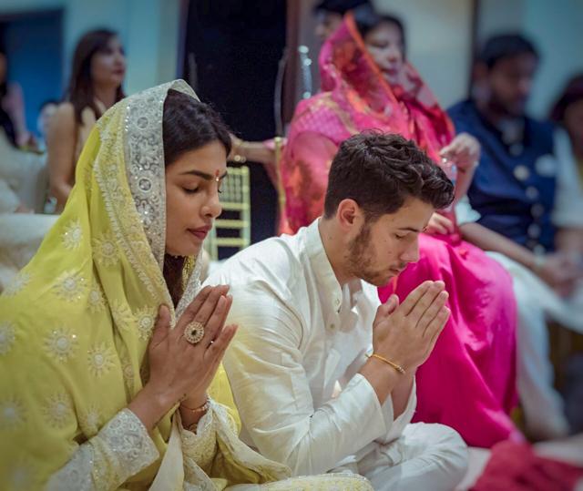 Priyanka Chopra and American singer Nick Jonas perform pre-wedding rituals at her Juhu residence. (PTI) Priyanka Chopra and American singer Nick Jonas perform pre-wedding rituals at her Juhu residence. (PTI)