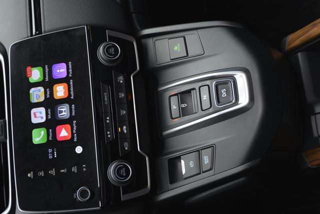 The car’s highlight is the all-digital instrument panel and the unique push button gear selector
