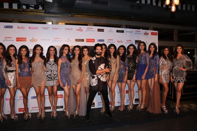 Shahid Kapoor looks excited as he poses with the contestants of Miss Diva pageant.