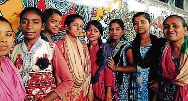 The artists who drew the Madhubani paintings on train compartments. The artists who drew the Madhubani paintings on train compartments.