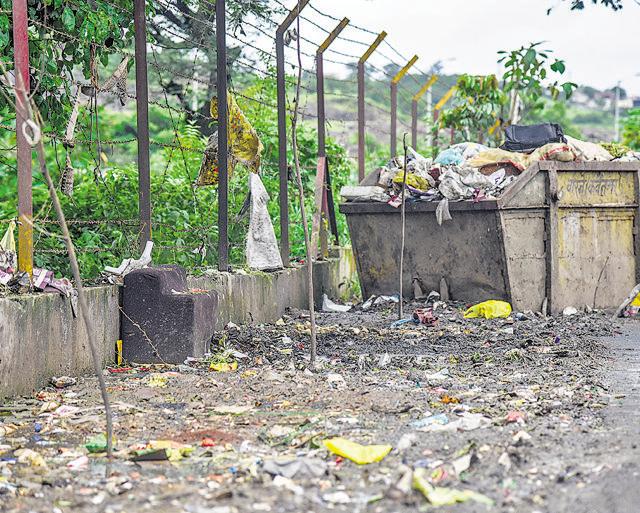Trees planted near a garbage in Shivne in Pune. (Sanket Wankhade/HT PHOTO) Trees planted near a garbage in Shivne in Pune. (Sanket Wankhade/HT PHOTO)