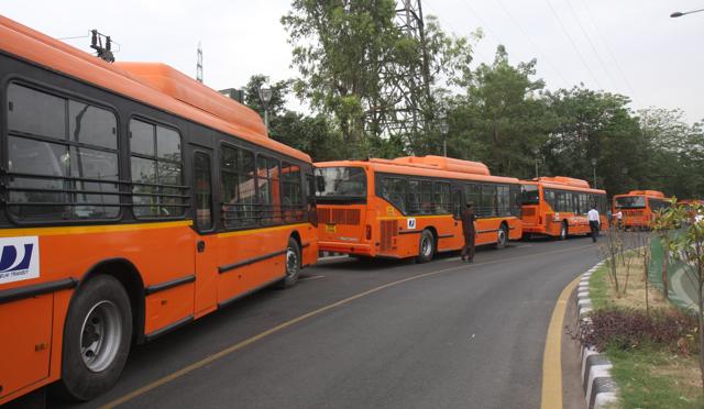 A fleet of orange-coloured DTC buses. (PHOTO: Sushil Kumar/HT) A fleet of orange-coloured DTC buses. (PHOTO: Sushil Kumar/HT)