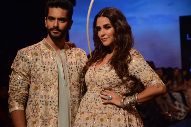 Mumbai: Actors Angad Bedi, Neha Dhupia showcase fashion designer Payal Singhal's creation at the Lakme Fashion Week Winter/Festive 2018, in Mumbai on Aug 25, 2018. (IANS)