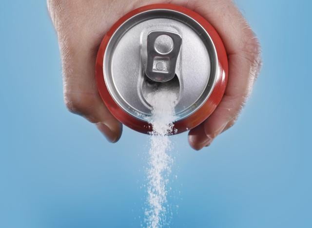 Carbonated drinks can enable plaque to produce more acid which can attack tooth enamel. (Shutterstock) Carbonated drinks can enable plaque to produce more acid which can attack tooth enamel. (Shutterstock)