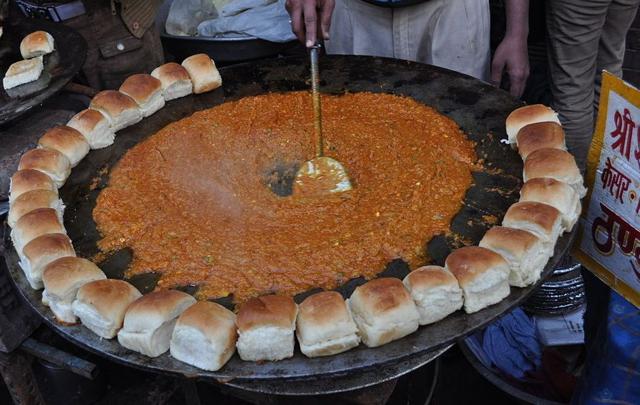 Pav bhaji served piping hot, the soft buns slathered in butter. Pav bhaji served piping hot, the soft buns slathered in butter.