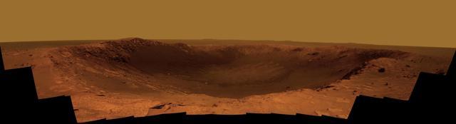 A Martian crater called "Santa Maria" is seen in this image released by NASA. The rover ‘Opportunity’ landed on this crater, which has a diameter about the length of a football field. (Reuters File Photo) A Martian crater called "Santa Maria" is seen in this image released by NASA. The rover ‘Opportunity’ landed on this crater, which has a diameter about the length of a football field. (Reuters File Photo)