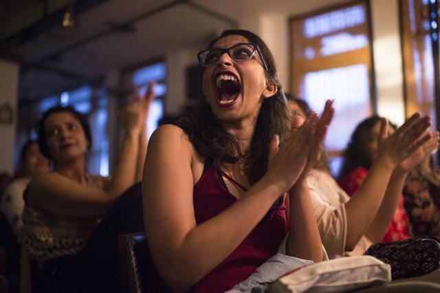 A woman applauds prior to Femapalooza, an Indian women-only comedy show, in New Delhi. (AFP) A woman applauds prior to Femapalooza, an Indian women-only comedy show, in New Delhi. (AFP)