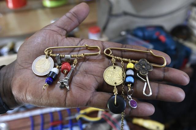 Some of the upcycled art made by Ngure. (AFP) Some of the upcycled art made by Ngure. (AFP)