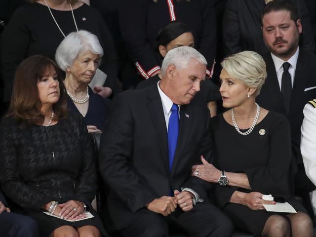 Cindy McCain (R), wife of John McCain, talks with US Vice President Mike Pence (C) and his wife Karen Pence (L) during a memorial service for the late-Senator John McCain in the Rotunda of the US Capitol, August 31, 2018 in Washington, DC. (AFP) Cindy McCain (R), wife of John McCain, talks with US Vice President Mike Pence (C) and his wife Karen Pence (L) during a memorial service for the late-Senator John McCain in the Rotunda of the US Capitol, August 31, 2018 in Washington, DC. (AFP)