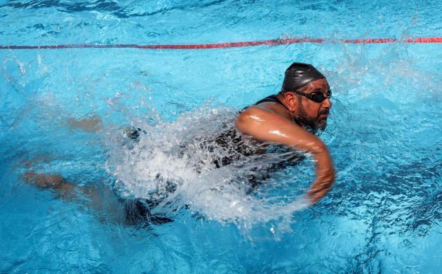 An Iraqi civilian who lost limbs during the government offensive against Islamic State (IS) group jihadists in the northern city of Mosul swims during a competitive sports event sponsored by the Kuwaiti government in Arbil, the capital of the Kurdish autonomous region in northern Iraq, on September 1, 2018. (AFP) An Iraqi civilian who lost limbs during the government offensive against Islamic State (IS) group jihadists in the northern city of Mosul swims during a competitive sports event sponsored by the Kuwaiti government in Arbil, the capital of the Kurdish autonomous region in northern Iraq, on September 1, 2018. (AFP)