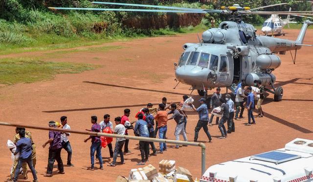 Indian Navy supplies Food and materials to the flood-affected people of Chengannur district of Kerala. (PTI File Photo) Indian Navy supplies Food and materials to the flood-affected people of Chengannur district of Kerala. (PTI File Photo)