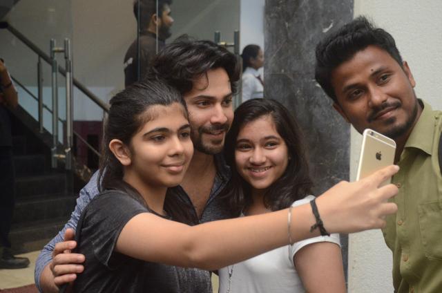 Varun Dhawan poses with fans outside his gym in Mumbai.
