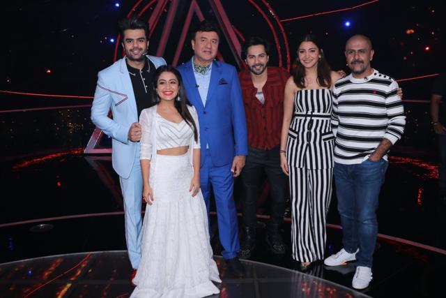 Music composer Vishal Dadlani, music director Anu Malik, singer Neha Kakkar and actors Varun Dhawan, Anushka Sharma and Maniesh Paul on the sets of singing reality show Indian Idol 10 in Mumbai on September 4, 2018. (IANS) Music composer Vishal Dadlani, music director Anu Malik, singer Neha Kakkar and actors Varun Dhawan, Anushka Sharma and Maniesh Paul on the sets of singing reality show Indian Idol 10 in Mumbai on September 4, 2018. (IANS)