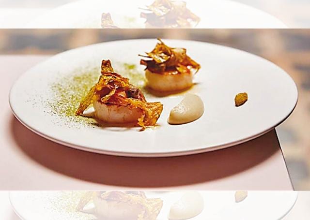 Scallops with artichoke and anchovies at the alluring Serge et Le Phoque restaurant Scallops with artichoke and anchovies at the alluring Serge et Le Phoque restaurant