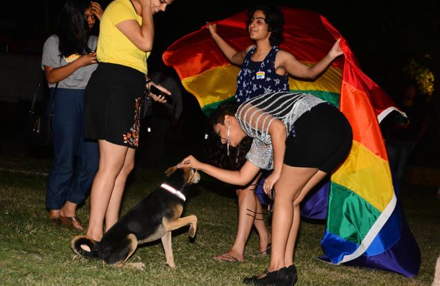 Members of LGBT community celebrate in Pune after the Supreme court's verdict which struck down on the British-era Section 377 of the Indian Penal Code that penalised people for their sexual orientation and ordered that gay sex among consenting adults is not an offence, on Thursday. (SHANKAR NARAYAN/HT PHOTO) Members of LGBT community celebrate in Pune after the Supreme court's verdict which struck down on the British-era Section 377 of the Indian Penal Code that penalised people for their sexual orientation and ordered that gay sex among consenting adults is not an offence, on Thursday. (SHANKAR NARAYAN/HT PHOTO)