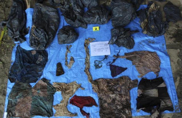 In this undated photo provided by the Veracruz State Prosecutor's Office shows clothing items found at the site of a clandestine burial pit in the Gulf coast state of Veracruz. (AP Photo) In this undated photo provided by the Veracruz State Prosecutor's Office shows clothing items found at the site of a clandestine burial pit in the Gulf coast state of Veracruz. (AP Photo)