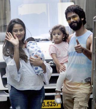 The happy family: Shahid Kapoor and his wife Mira Rajput with their newborn son Zain and daughter Misha Kapoor pose leaving the Hinduja hospital on Friday. (PTI) The happy family: Shahid Kapoor and his wife Mira Rajput with their newborn son Zain and daughter Misha Kapoor pose leaving the Hinduja hospital on Friday. (PTI)