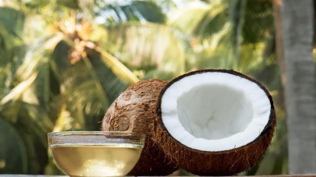 Coconut oil contains lauric and caprylic fatty acids that remove harmful yeast and bacteria and restore your stomach’s acidity level. (Shutterstock)