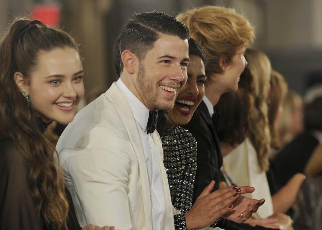 (From left) Katherine Langford, Nick Jonas and fiancee Priyanka Chopra at the Ralph Lauren 50th Anniversary Fashion Show during New York Fashion Week, September 7, 2018. (AP Photo/Diane Bondareff) (AP) (From left) Katherine Langford, Nick Jonas and fiancee Priyanka Chopra at the Ralph Lauren 50th Anniversary Fashion Show during New York Fashion Week, September 7, 2018. (AP Photo/Diane Bondareff) (AP)