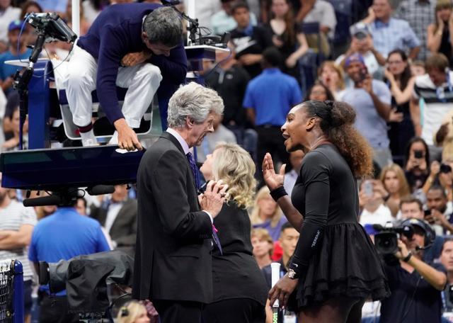 Serena Williams argues with tournament director Brian Earley and chair umpire Carlos Ramos while playing Naomi Osaka of Japan. (USA TODAY Sports via Reuters) Serena Williams argues with tournament director Brian Earley and chair umpire Carlos Ramos while playing Naomi Osaka of Japan. (USA TODAY Sports via Reuters)