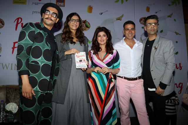 Twinkle Khanna with Akshay Kumar and actors Sonam Kapoor Ahuja and Ranveer Singh at the launch of her book Pyjamas Are Forgiving in Mumbai on Sept 7. (IANS) Twinkle Khanna with Akshay Kumar and actors Sonam Kapoor Ahuja and Ranveer Singh at the launch of her book Pyjamas Are Forgiving in Mumbai on Sept 7. (IANS)