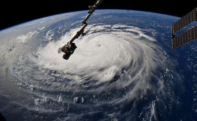 This NASA handout photo shows a view from the International Space Station of Hurricane Florence off the US east coast in the Atantic Ocean on September 10, 2018. (AFP Photo) This NASA handout photo shows a view from the International Space Station of Hurricane Florence off the US east coast in the Atantic Ocean on September 10, 2018. (AFP Photo)