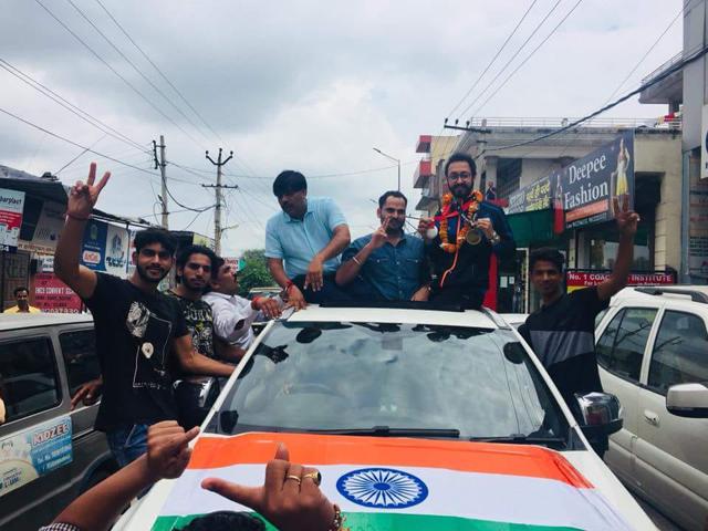 Shooter Abhishek Verma received a warm welcome by friends and family alike.