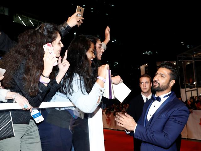 Actor Vicky Kaushal greets fans as he arrives for the premiere of Husband Material at the Toronto International Film Festival in Toronto, Ontario, Canada, September 11, 2018. (REUTERS)