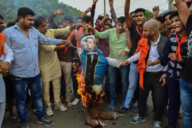 Vishva Hindu Parishad and Bajrang Dal activists burn an effigy of Bollywood actor Salman Khan during a protest over his upcoming movie Loveratri, in Agra. (PTI) Vishva Hindu Parishad and Bajrang Dal activists burn an effigy of Bollywood actor Salman Khan during a protest over his upcoming movie Loveratri, in Agra. (PTI)