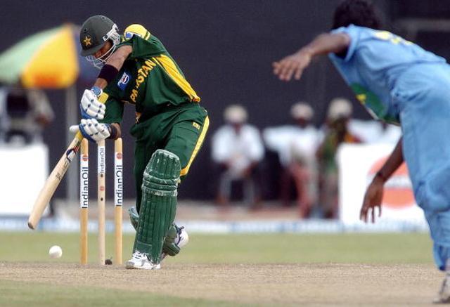 COLOMBO, SRI LANKA: Pakistani cricketer Shoaib Malik (L) plays a stroke during the Asia Cup match between India and Pakistan at the R. Premedasa International Cricket Ground in Colombo, 25 July 2004. (AFP/Getty Images) COLOMBO, SRI LANKA: Pakistani cricketer Shoaib Malik (L) plays a stroke during the Asia Cup match between India and Pakistan at the R. Premedasa International Cricket Ground in Colombo, 25 July 2004. (AFP/Getty Images)