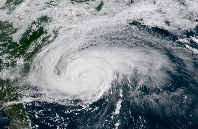This National Oceanic and Atmospheric Administration (NOAA) satellite image taken on September 13, 2018, shows Hurricane Florence beginning to hit the US east coast. (AFP) This National Oceanic and Atmospheric Administration (NOAA) satellite image taken on September 13, 2018, shows Hurricane Florence beginning to hit the US east coast. (AFP)