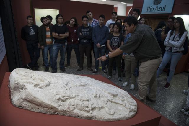 Visitors watches a nearly 1,500-year-old carved altar from the Maya site "La Corona," located in the northern Guatemalan department of Peten, at the National Museum of Archaeology and Ethnology in Guatemala City on September 12. (AP Photo) Visitors watches a nearly 1,500-year-old carved altar from the Maya site "La Corona," located in the northern Guatemalan department of Peten, at the National Museum of Archaeology and Ethnology in Guatemala City on September 12. (AP Photo)